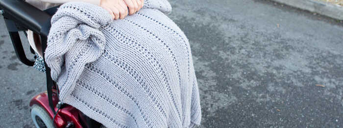 occupational therapist throwing ball to client