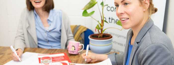 occupational therapist throwing ball to client